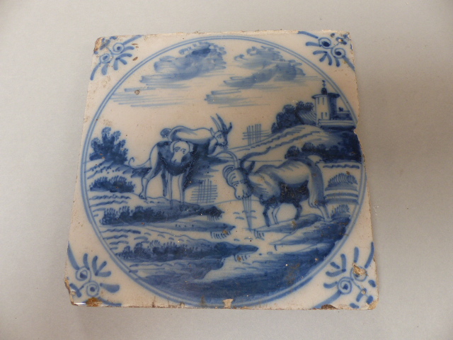 Four Delftware tiles - 1) Decorated in Polychrome colours depicting a vase of flowers. 2) An Early - Image 5 of 10