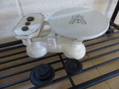 Set of Avery Scales and weights with a China platform having printed marks on it