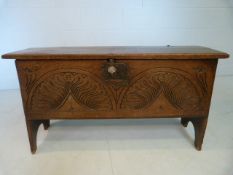 WITHDRAWN:Late 17th Century/ Early18th century Six plank oak coffer raise on semi circle cut legs.