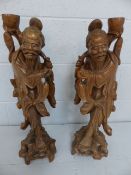 Oriental: Pair of Carved wooden Chinese figures Approx 59cm high) depicting fishermen with their