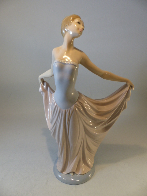 Lladro - figure of a ballerina, head tilted back and holding dress up