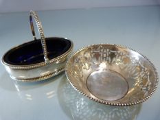 Hallmarked silver salt with blue glass liner London 1819 maker Hyam Hyams. Along with a small