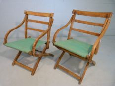 Pair of vintage bentwood teak lounger type chairs