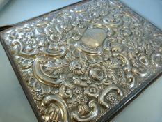 Edwardian silver desk blotter of rectangular form. Cartouche to middle with Rampant lion crest