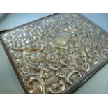 Edwardian silver desk blotter of rectangular form. Cartouche to middle with Rampant lion crest