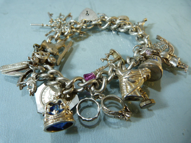 Two hallmarked silver chains with approx 35 silver coloured charms along with a silver box chain and - Image 5 of 6