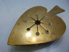 Unusual Trench Art brass trivet, with impressed instructions to base on how to load a firearm -