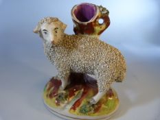 Early Staffordshire spill vase of a sheep
