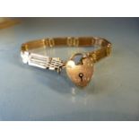 9ct Gold five bar bracelet with heart shaped Lock (total weight approx 20.1g)