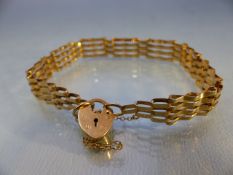 9ct Gold four bar bracelet with heart shaped clasp (total weight approx 6.8g)