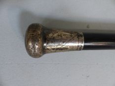 Hallmarked silver topped cane with ebonised stick. Hallmarks for London 1901