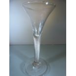 Large Georgian wine glass c1770 with multiple twist opaque stem and large splayed foot. Rough Pontil