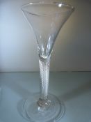 Large Georgian wine glass c1770 with multiple twist opaque stem and large splayed foot. Rough Pontil