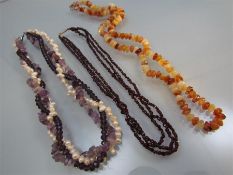 Three bead necklaces - 1) Garnet faceted 3 string with a rolled gold barrel clasp. 2) Twisted Rope