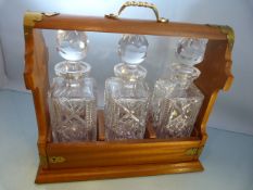 Three decanter brass bound Tantalus with Key (in Office)