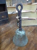 Antique copper ships bell with twisted metal loop handle. Monogrammed to front T.B.E.H