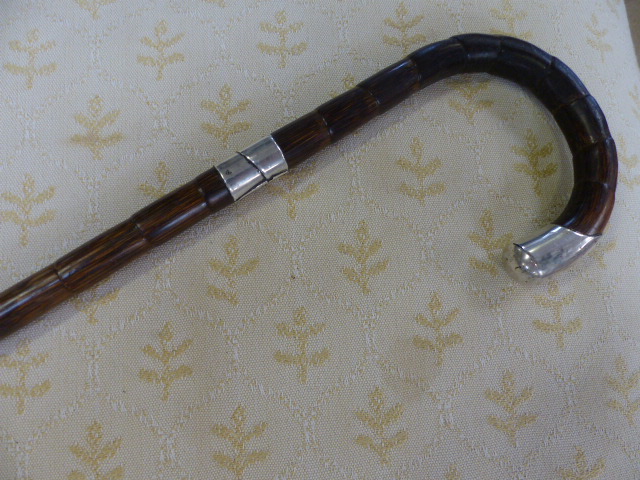 Hallmarked silver banded cane with mounted silver handle. London by J Howell & Co Ltd - Image 2 of 2