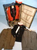 Officers travel trunk containing dress uniforms and three others. Along with two hats and a quantity