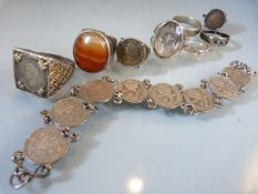 Collection of silver items to include a threepence bracelet, three silver rings with threepence