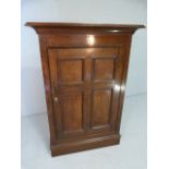 19th Century oak cupboard of small size with bracket feet and ivory escutcheon