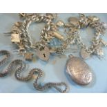 Two hallmarked silver chains with approx 35 silver coloured charms along with a silver box chain and