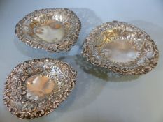 Set of THREE silver hallmarked graduated in size matching heart shaped bon bon dishes with pierced