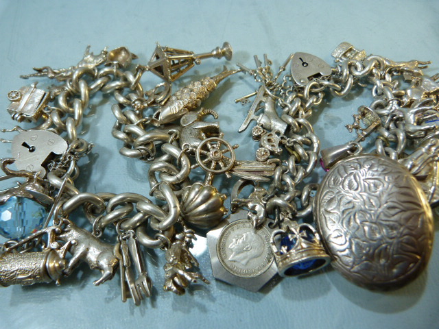 Two hallmarked silver chains with approx 35 silver coloured charms along with a silver box chain and - Image 6 of 6