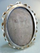 Victorian Hallmarked Silver Photo frame, Oval in shape with silver twisted ribbon decoration: