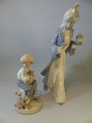 Lladro - figure of a young boy with his puppy No. 5401 along with a tall Nao figure of an Islamic