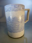 Staffordshire pearlware tankard of large form printed in blue and white with Chinoiserie scenes