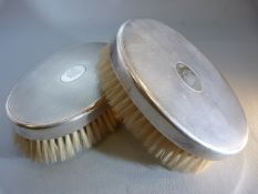 Two Birmingham 1927 hallmarked silver mounted brushes