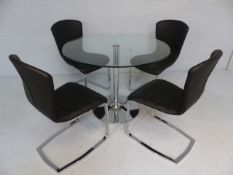 Glass Round Pedestal table and four chrome and black leatherette 'Cantilever type chairs