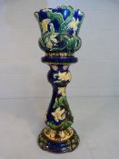 Majolica Jardiniere on stand marked OXFORD 2s to base. Floral trailing on a dark blue ground.