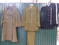 Two sets of Military Dress uniform - to include trousers, overcoat etc