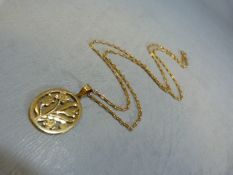 9ct Gold chain with pendant of foliate design and the loop marked 585 14ct (total weight 3.5g)