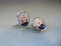 Pair of silver and Enamel cufflinks depicting ships at sail