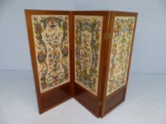 Three fold screen decorated with embroidered panels