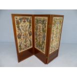 Three fold screen decorated with embroidered panels