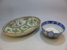 A Chinese Famile Rose Oval bowl and a small Chinese blue and white bowl