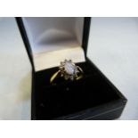 Ladies 9ct Gold ring (size M) with oval central Opal