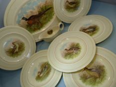 Wood's Ivory Ware platter, 6 dinner plates and a Gravy Boat. All Decorated with various Game birds.