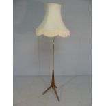 Mid Century 'bullet' style lamp on tripod feet.