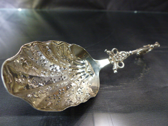 Dutch hallmarked silver sifter Stamped with lion to back and 2 under. The unusual spoon with rearing - Image 3 of 11