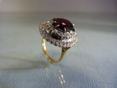 18ct yellow gold Garnet & Diamond ring. Garnet approx 3ct's and surrounded by two rows of