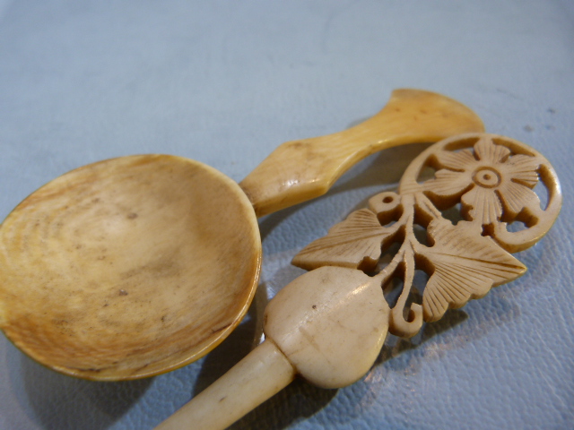 Antique carved medicine spoon and one other with long stem leading to a floral pierced top. - Image 4 of 5