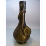 Japanese bronze bottle vase with applied dragon decoration. The tail of the dragon circling the