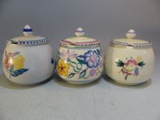 Poole Pottery Three condiment pots etc