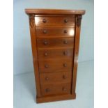 Victorian Mahogany Wellington chest of seven drawers, carved brackets and locking side plate on