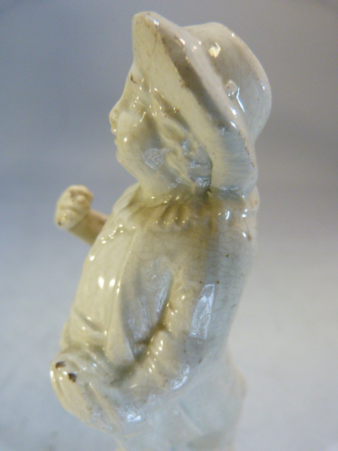 Two Staffordshire pottery 'Blanc de Chine; figures modelled as a large man carrying grapes and a - Image 14 of 18