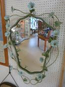 Modern wall mirror with vine leaves and flowers surrounding